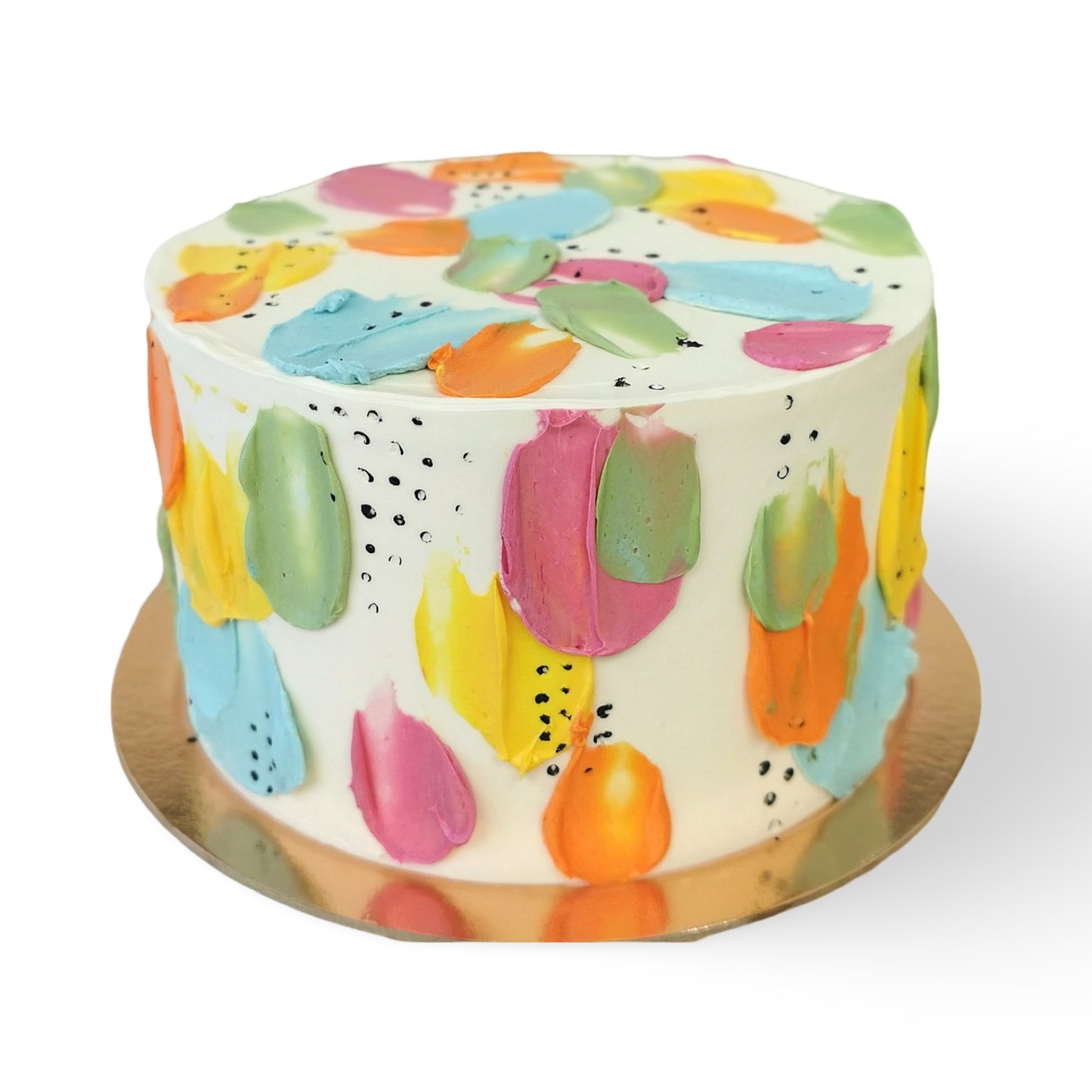 krāsainu triepienu kūka ar baltu apdari