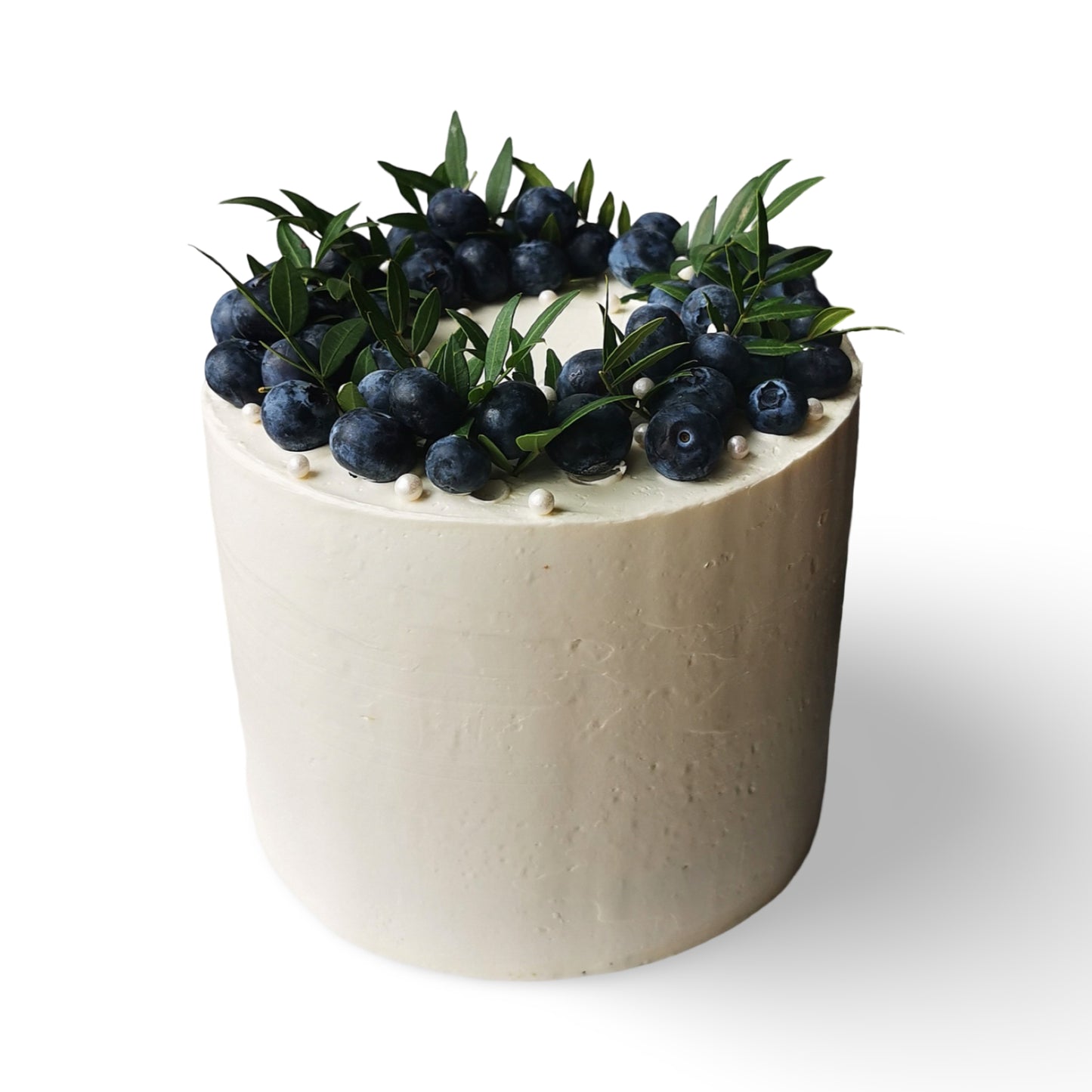 Vegāniskā kūka ar melleņu/zaļumu dekoru